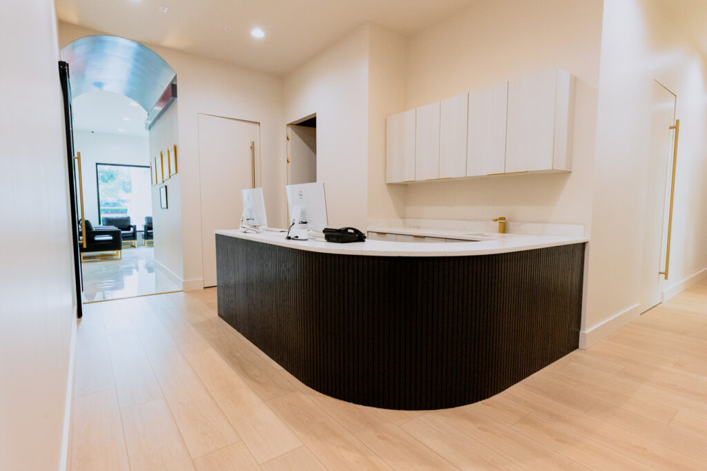 The view from the Lee Plastic Surgery & Medical Spa front desk as a patient walks in for their consultation to learn more about testosterone replacement therapy in Port St. Lucie.